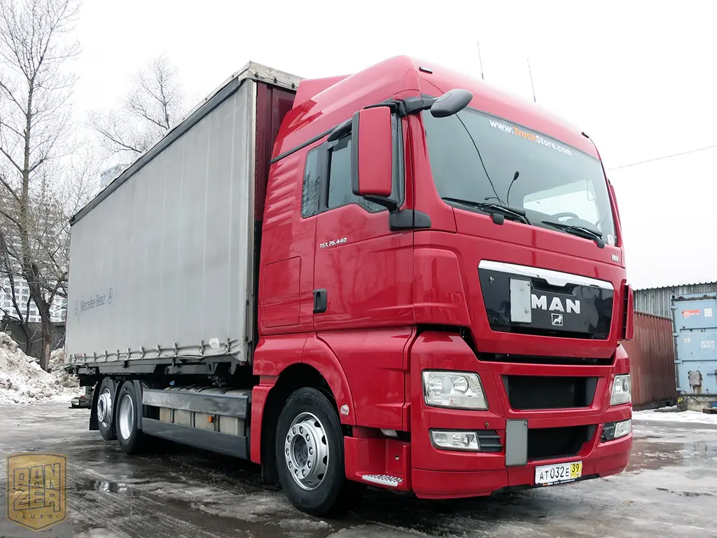 MAN TGX 26.440, тент-штора 52м3, 6х2, 16 тонн, 2011г, высокая кабина - фото 8