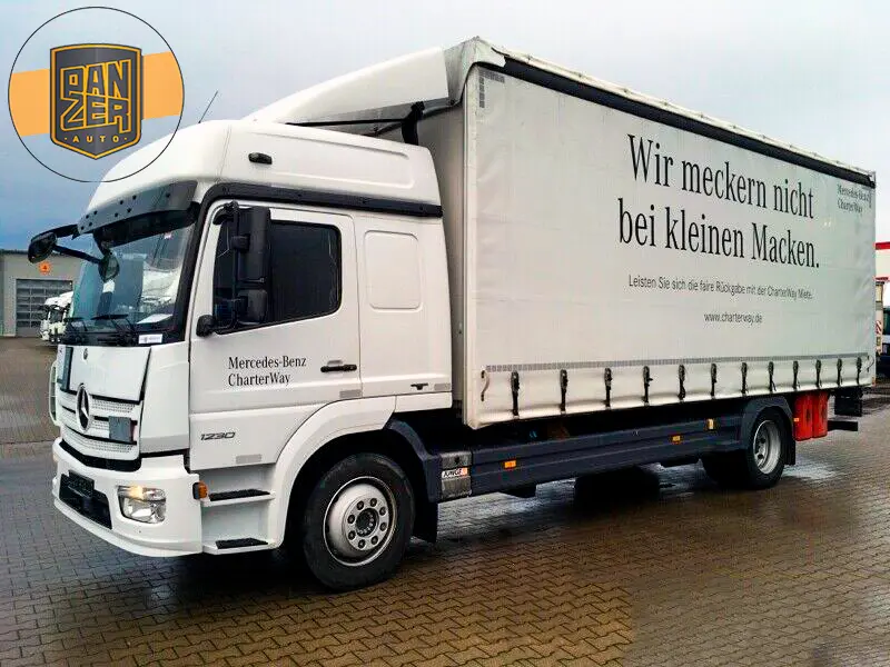 Mercedes Atego 1230L NEW, 12/2015 год, штора 47 м3, гидролифт, пробег 159 тыс.км - фото