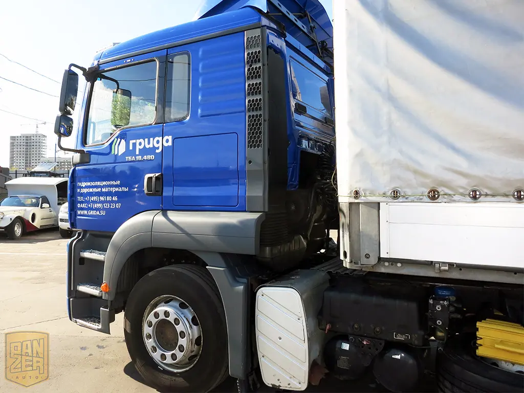 Тягач MAN TGA 18.480 с полуприцепом Schmitz S01, сдвижной тент 92 м3 - фото 7