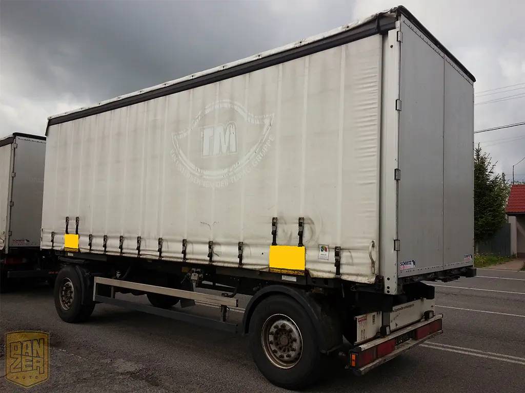 Прицеп шторный Schmitz Cargobull, 2010 год, 52 куба, ворота - фото