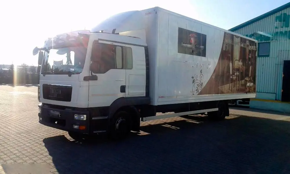 Фургон MAN TGL 8.220, 2010 г, 7.5 метра, ворота, без пробега по РФ - фото