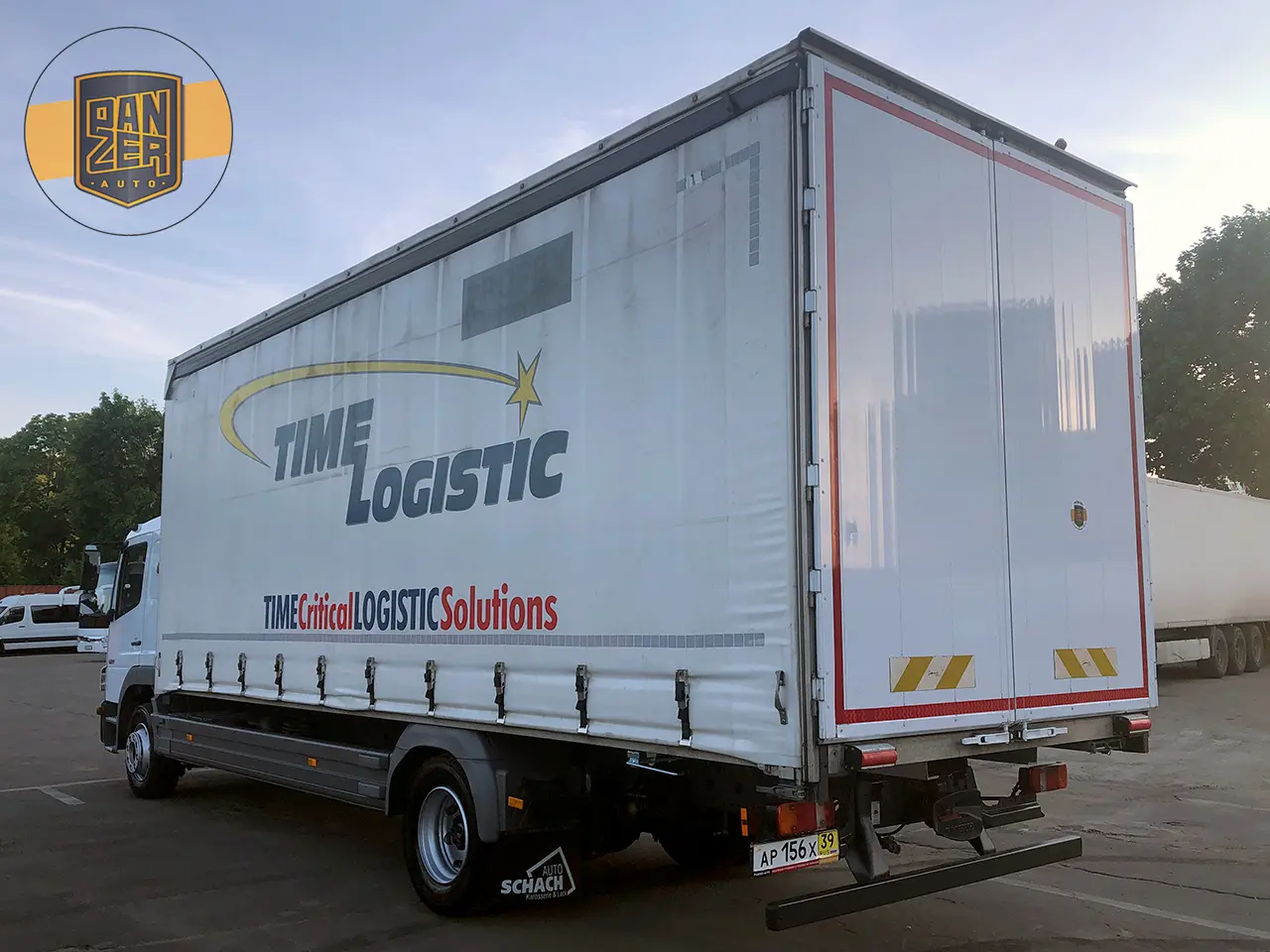 Mercedes Atego 1229L, 2013г, штора 48 кубов, ворота - фото