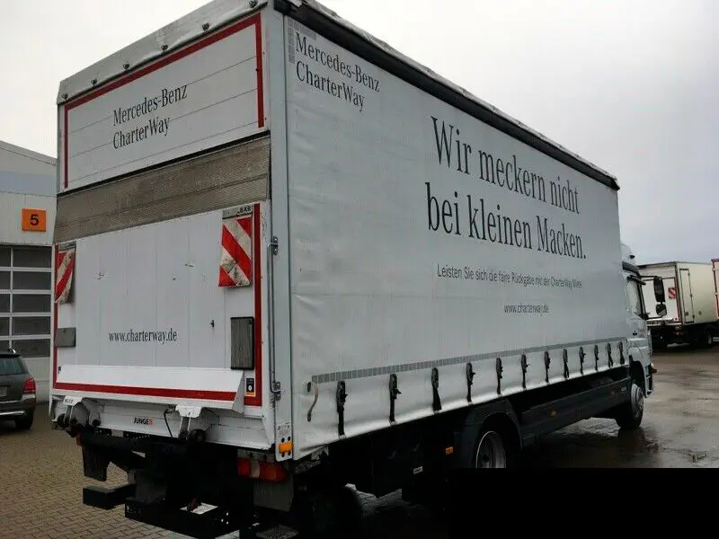 Mercedes Atego 1230L NEW, 12/2015 год, штора 47 м3, гидролифт, пробег 159 тыс.км - фото
