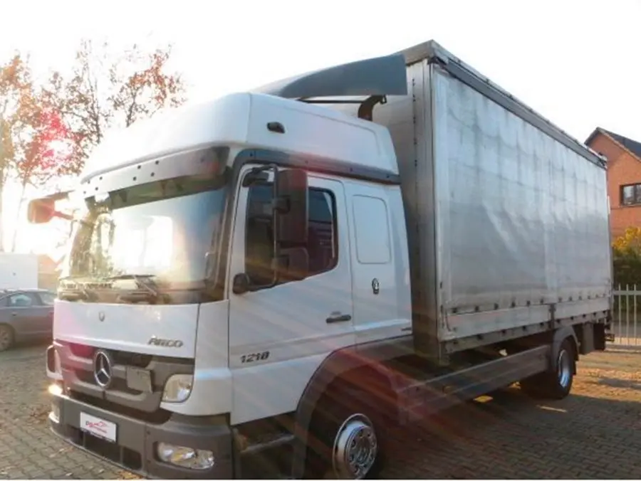 Mercedes-Benz Atego 1218L, 12/2011, штора-борт 44м3, гидролифт, 2 спальника - фото