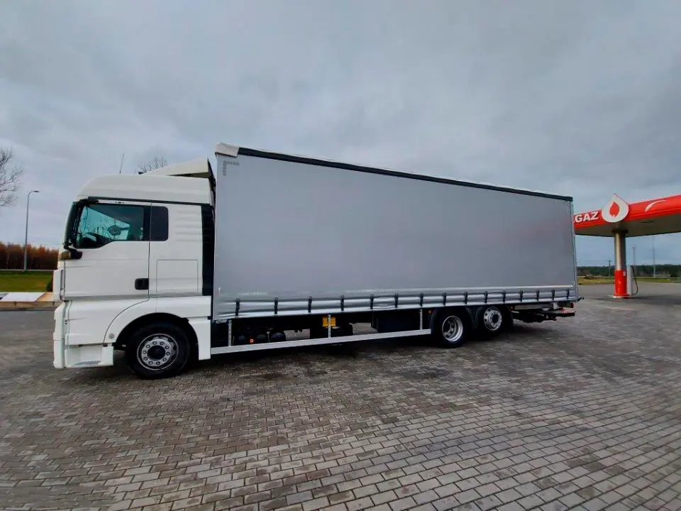 Кубовик MAN TGX 26.440, 6х2, 2015 год, штора 71 куб, 24 европалета, гидроборт, без пробега по РФ - фото 14
