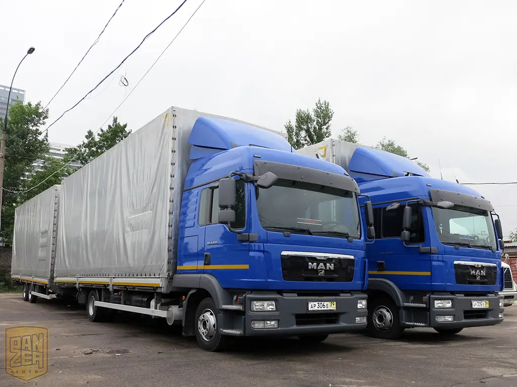 Тентованный грузовик MAN TGL 8.220, 60 м3, 2 спальника, 2011г - фото 7
