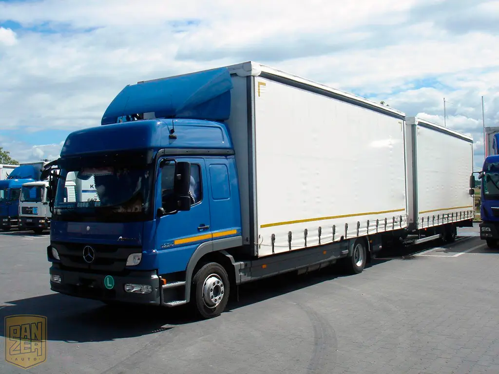 Mercedes Atego 1224 автопоезд 120м3, 2013 год, полная штора - фото
