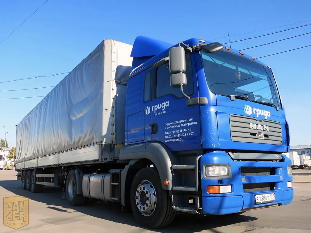 Тягач MAN TGA 18.480 с полуприцепом Schmitz S01, сдвижной тент 92 м3 - фото 8