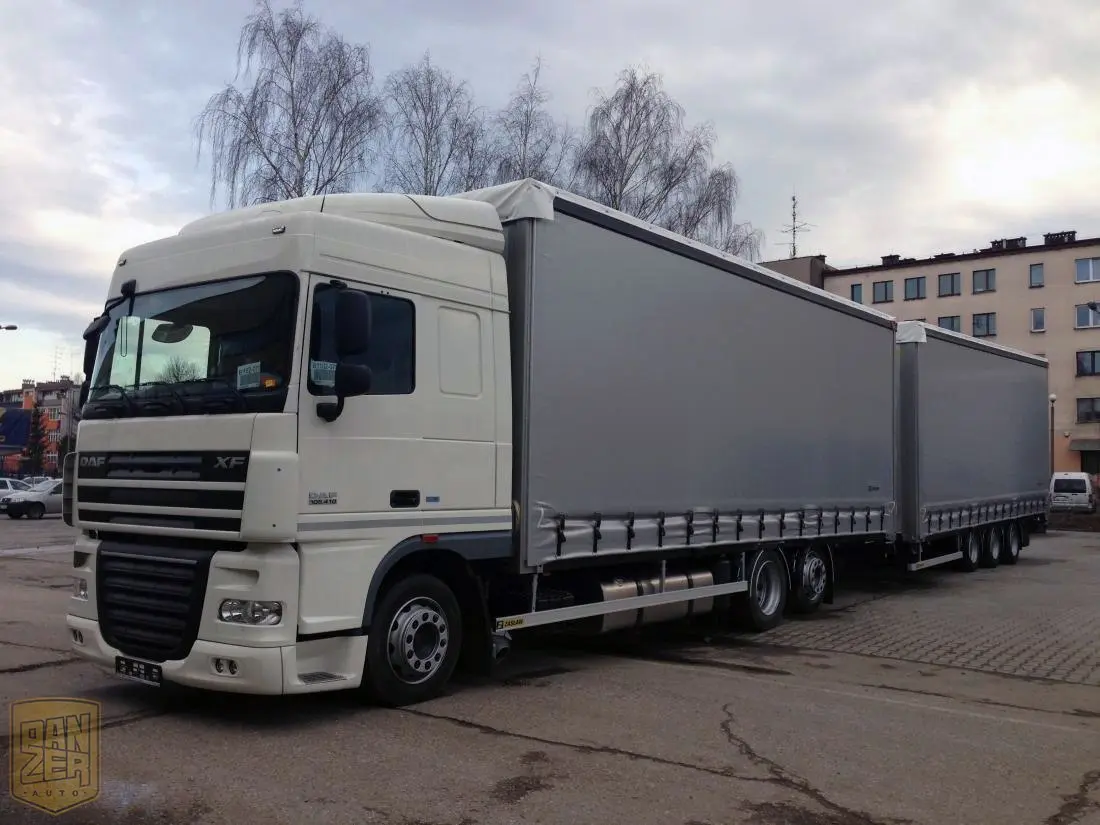 Автопоезд DAF XF 105.410 новый, 120м3 штора, общая г/п 31т, прицеп тридем, 2013г, максимальная комплектация - фото