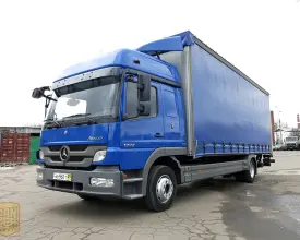 Грузовик тентованный Mercedes Atego 1222, 2011 год | photo 0