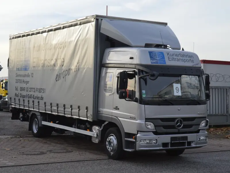 Грузовик тентованный Mercedes Atego 1224, 2011 год | photo 0