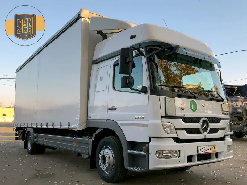 Грузовик тентованный Mercedes Atego 1229, 2012 год | photo 0