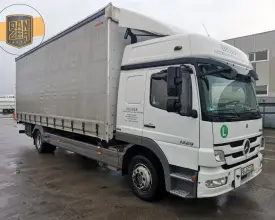 Грузовик тентованный Mercedes Atego 1229, 2013 год | photo 0