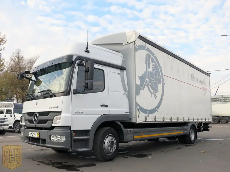 Грузовик тентованный Mercedes Atego 1229, 2012 год | photo 0