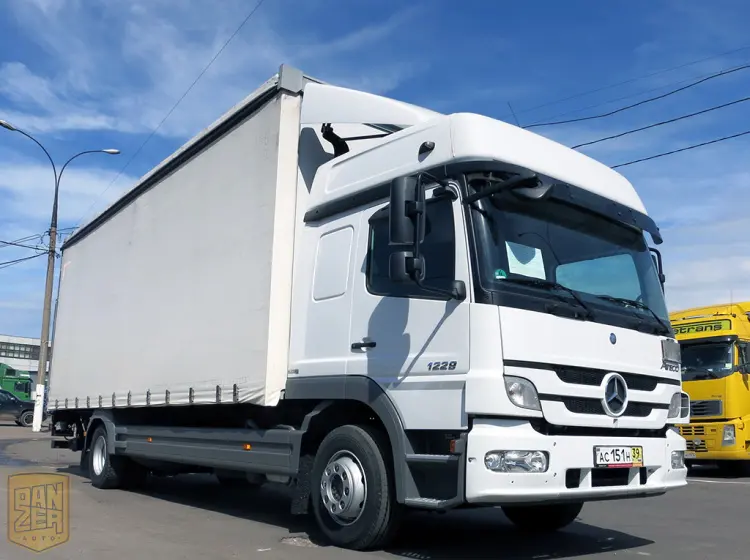 Mercedes-Benz Atego 1229L, 2012г, штора 48м3, гидролифт, 2 спальника - фото 8