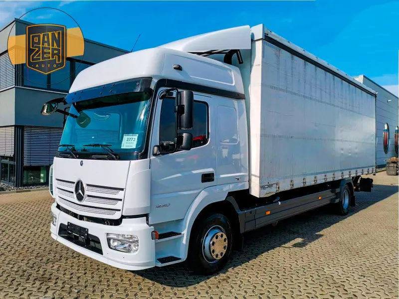 Грузовик тентованный Mercedes Atego 1230, 2014 год | photo 0