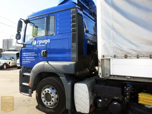 Тягач MAN TGA 18.480 с полуприцепом Schmitz S01, сдвижной тент 92 м3 - фото 7
