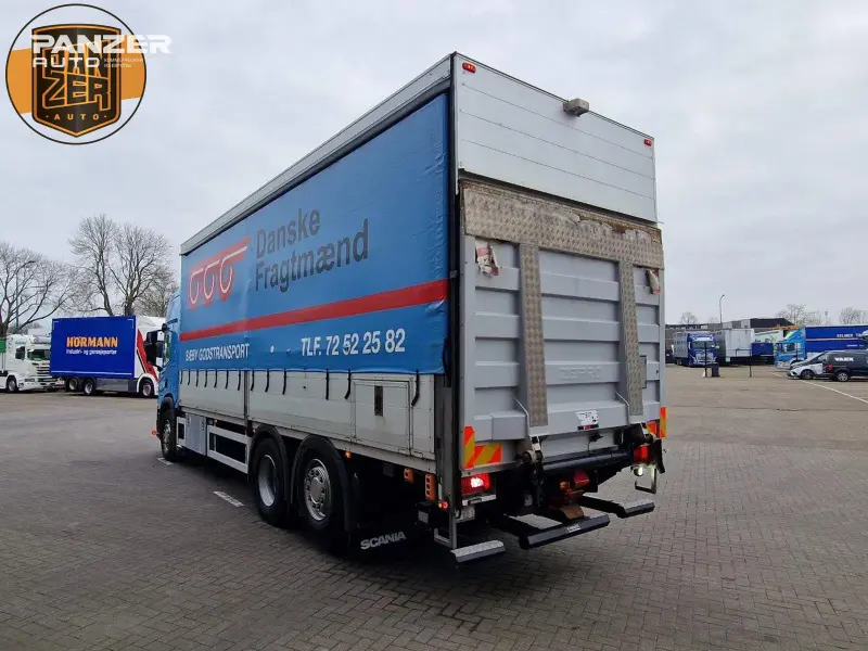 Грузовик тентованный Scania P 450, 2020 год | photo 1
