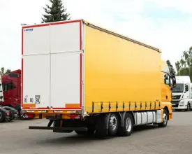 Грузовик тентованный MAN TGX 26.440, 2015 год | 1