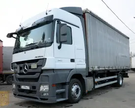 Грузовик тентованный Mercedes Actros 1841, 2010 год | photo 0