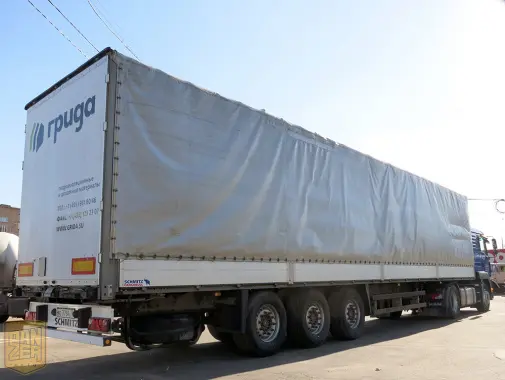 Тягач MAN TGA 18.480 с полуприцепом Schmitz S01, сдвижной тент 92 м3 - фото