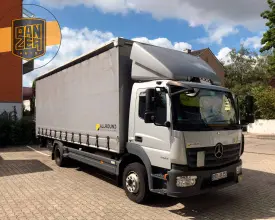 Грузовик тентованный Mercedes Atego 1224, 2014 год | photo 0