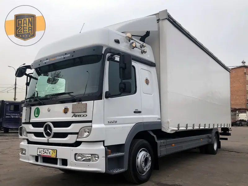 Грузовик тентованный Mercedes Atego 1229, 2011 год | photo 0