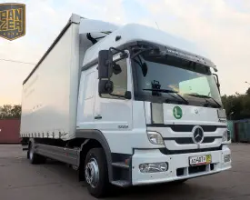 Грузовик тентованный Mercedes Atego 1229, 2011 год | photo 0