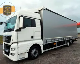 Грузовик тентованный MAN TGX 26.440, 2013 год | photo 0