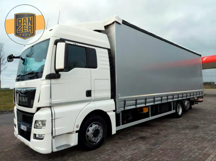Кубовик MAN TGX 26.440, 6х2, 2015 год, штора 71 куб, 24 европалета, гидроборт, без пробега по РФ - фото