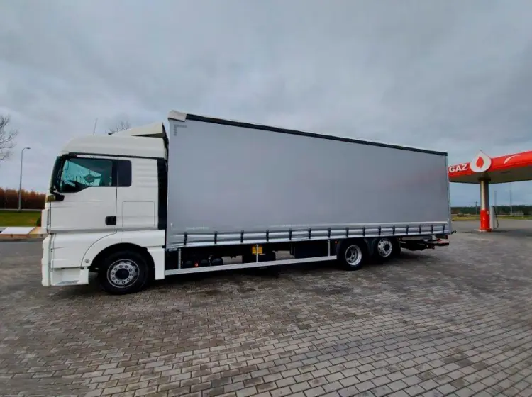 Кубовик MAN TGX 26.440, 6х2, 2015 год, штора 71 куб, 24 европалета, гидроборт, без пробега по РФ - фото 14