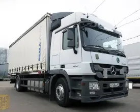 Грузовик тентованный Mercedes Actros 1841, 2010 год | photo 0