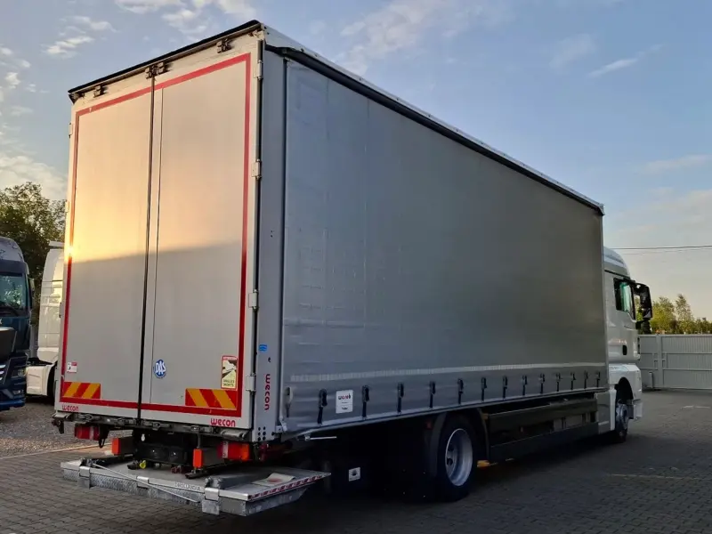 Грузовик тентованный MAN TGX 18.360, 2019 год | photo 1