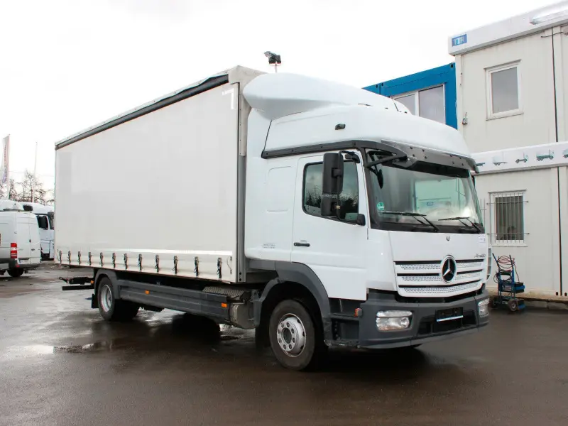 Грузовик тентованный Mercedes Atego 1230, 2015 год | photo 1