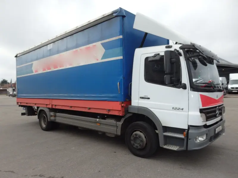 Грузовик тентованный Mercedes Atego 1224, 2010 год | photo 1