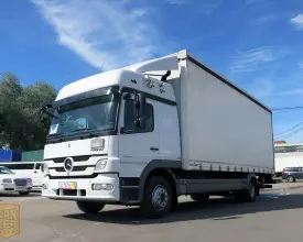 Грузовик тентованный Mercedes Atego 1229, 2012 год | photo 0