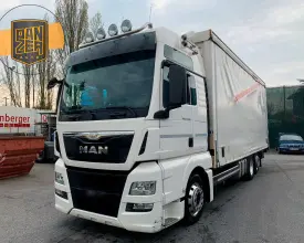 Грузовик тентованный MAN TGX 24.480, 2014 год | photo 0