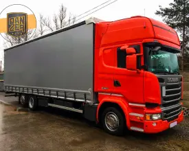 Грузовик тентованный Scania R 410, 2015 год | photo 0