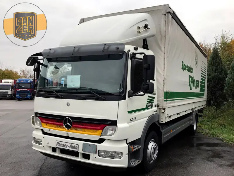 Грузовик тентованный Mercedes Atego 1224, 2011 год | photo 0