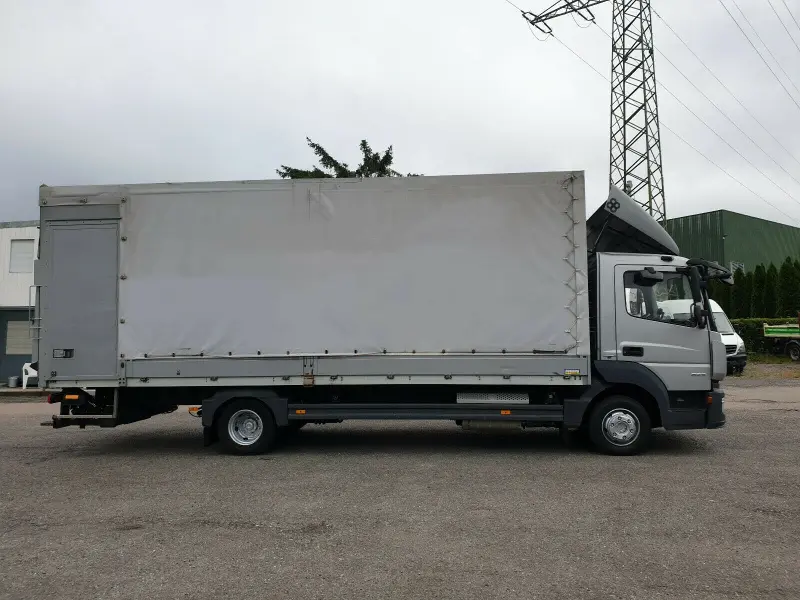 Грузовик тентованный Mercedes Atego 823, 2015 год | photo 1