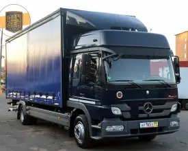 Грузовик тентованный Mercedes Atego 1229, 2012 год | photo 0