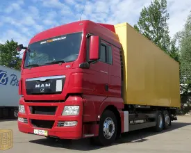 Грузовой фургон MAN TGX 26.440, 2011 год | photo 0